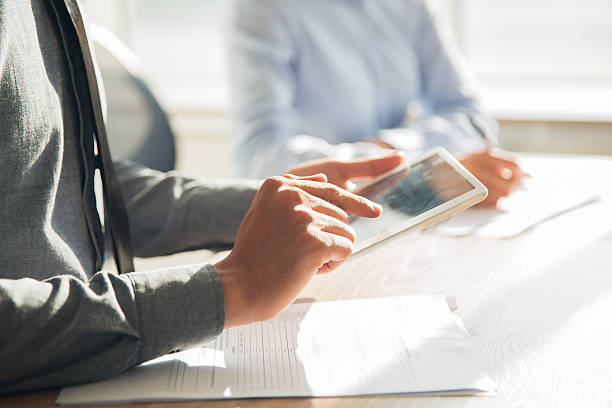 istock Businessman working with digital tablet in office 636172786