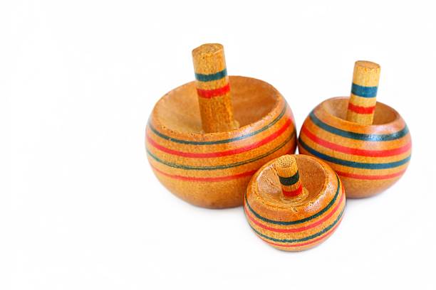 istock Wooden Spinning Top 636173260