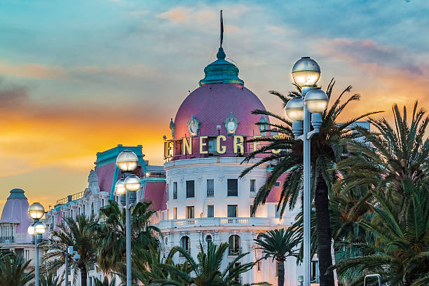 Nice, France - April 20, 2016: Cityscape with the hotel Negresco. Negresco is the famous luxury hotel on Promenade des Anglais in Nice, baie des Anges, symbol of the Cote d'Azur or French Riviera
