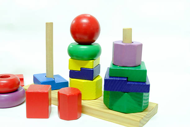 istock wooden toy on white background. 636174024