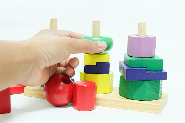 istock wooden toy on white background. 636174192