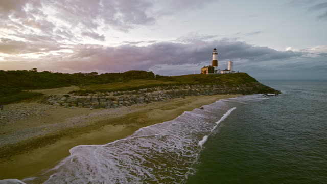 Scenic aerial view of Montauk Lighthouse at sunset. Long Island, New York State, USA