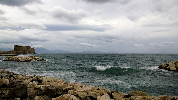 View of the restless Gulf of Naples with a great-looking wave stock photo