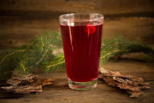 Healthy everage with black and red raspberries on the wooden