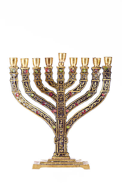 istock Nine-branched menorah isolated on blue background 636179930