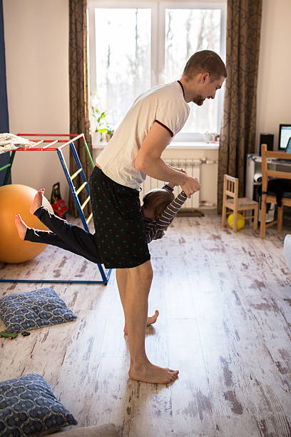 istock Dad plays with Toddler boy,  real interior, fatherhood 636181392