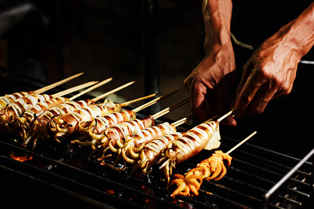 istock Street food preparing outdoors in Asia 636184812