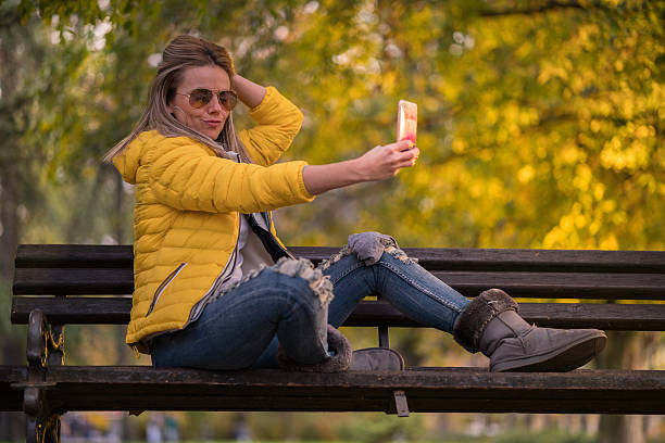 istock young woman use phone 636184872