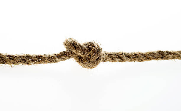 istock Close up of rope with a knot 636185312