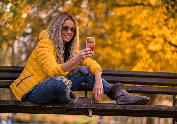 istock young adult with phone 636185682