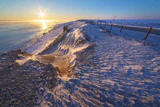 istock Winter road at sunrise, Sakhalin Island 636187270