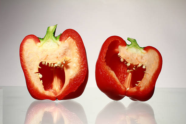 istock fresh red paprika isolated on white background 636187728