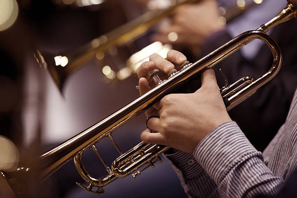 istock Hands of man playing the trumpet 636191814