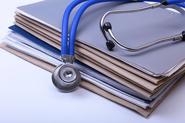 istock Stethoscope and medical equipment on a light blue background 636193768