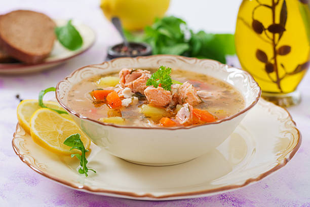 istock Salmon soup with vegetables in bowl 636194458