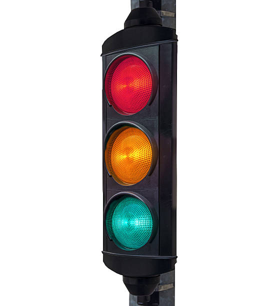 istock Green, Yellow and Red traffic light isolated on white 636197008