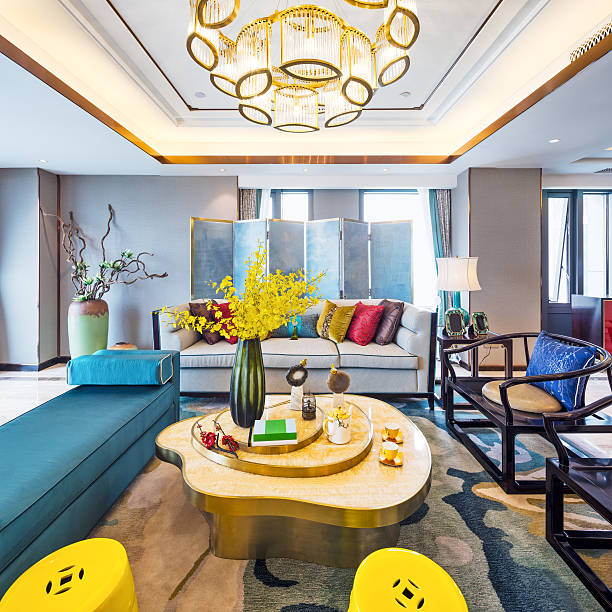 A high-end jewelry shop window in Dubai showcases gleaming gold rings, bracelets, and necklaces on plush display stands. The opulent arrangement emphasizes luxury, wealth, and fashion, inviting shoppers to explore premium craftsmanship.