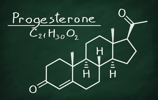 Structural model of Progesterone on the blackboard.