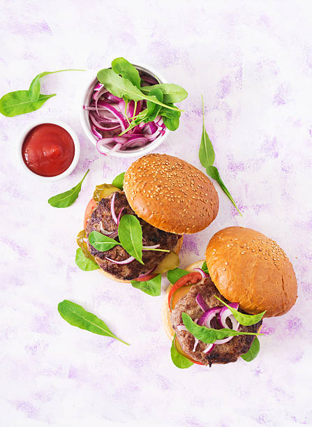 istock Big sandwich - hamburger burger with beef, tomato and onions 636200530