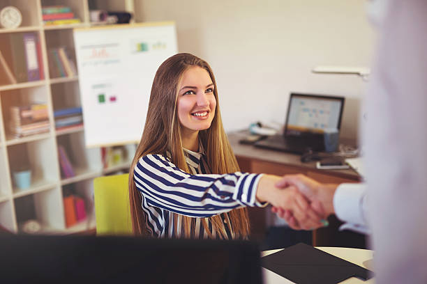 istock Two successful business partner shaking hands in the office 636201764
