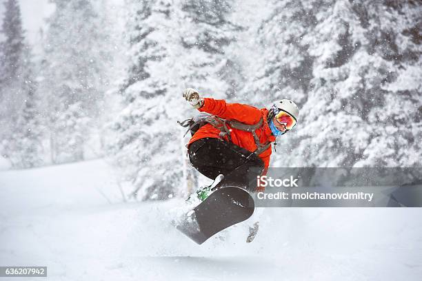 Snowboarder Jumps Backcountry Freeride Offpiste Ski Resort Stock Photo - Download Image Now