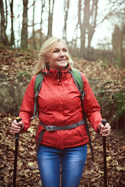 istock Woman admiring views in the forest 636212928