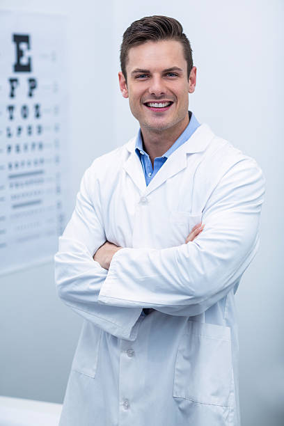 istock Optometrist standing in ophthalmology clinic 636214254