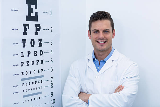 istock Optometrist standing in ophthalmology clinic 636221050