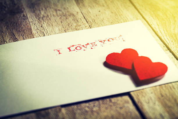 istock Envelope with message I love you and hearts 636223598
