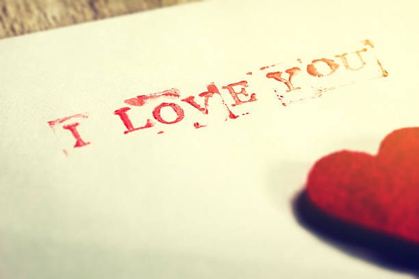 istock Envelope with message I love you and hearts 636223624