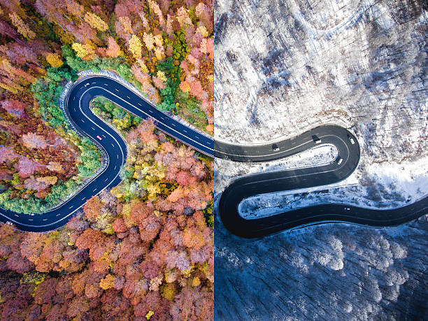 istock Winding road autumn vs. winter. Aerial view 636225620
