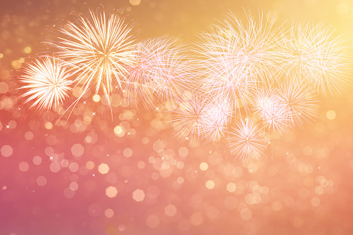 Abstract fireworks celebration on bokeh background.Fireworks for copyspace and background