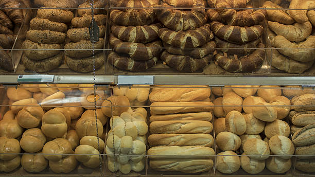 istock Various bread on shelf of bakery shop 636228192