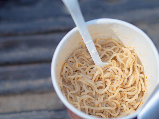 istock Instant noodle cups and fork for the scoop. 636228478
