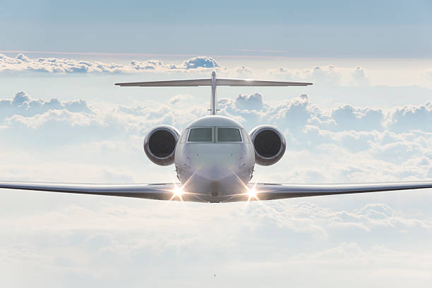 istock Private airplane fly over clouds at dusk 636231710