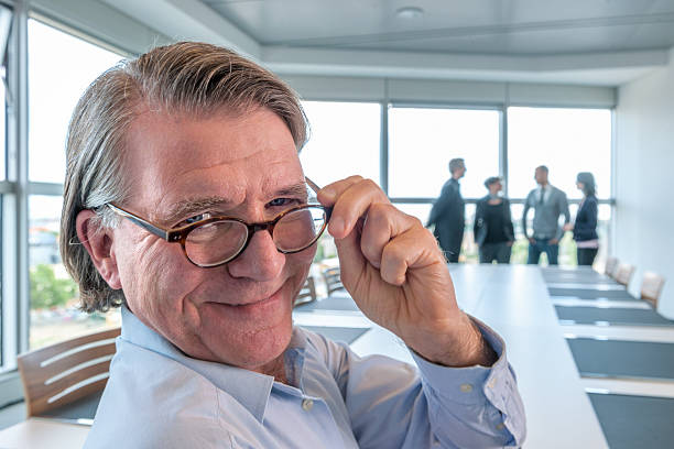 istock businessman in contemporary board room 636231806
