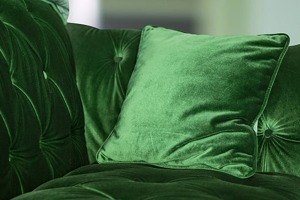 istock Purple green pillows on the sofa 636232158