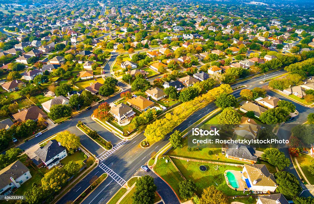 Birds Eye View Suburbia Homes Austin Texas Sunset Above Autumn Colors Aerial on Suburbs Homes in Austin , Texas. Looking down Birds Eye View on Suburbia Homes in Austin , Texas a Colorful Residential Area in Fall Autumn Residential District Stock Photo