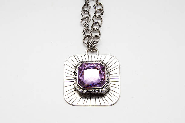 istock Necklace with large purple stone 636233804