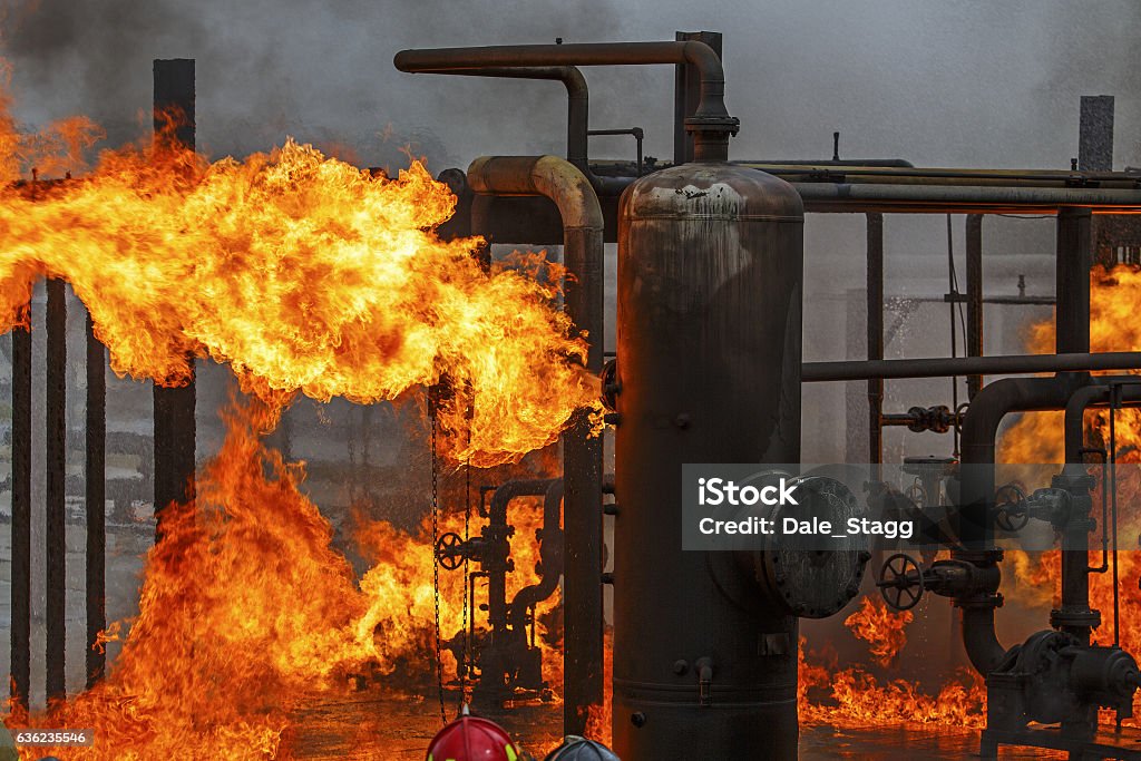 Industrial fire training for refinery or chemical plant fire brigade Industrial fire training for refinery or chemical plant fire brigade or fireman Fire - Natural Phenomenon Stock Photo