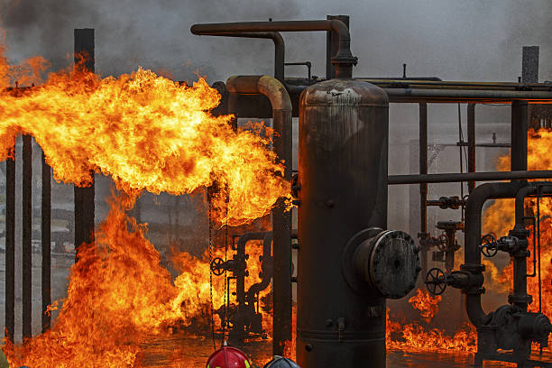 Industrial fire training for refinery or chemical plant fire brigade Industrial fire training for refinery or chemical plant fire brigade or fireman chemical plant stock pictures, royalty-free photos & images