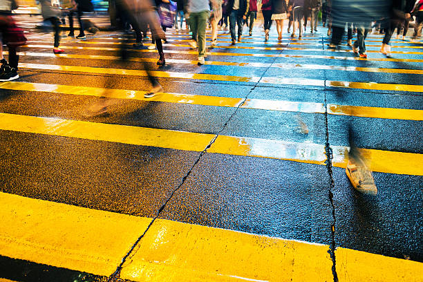 istock people crossing street 636235854