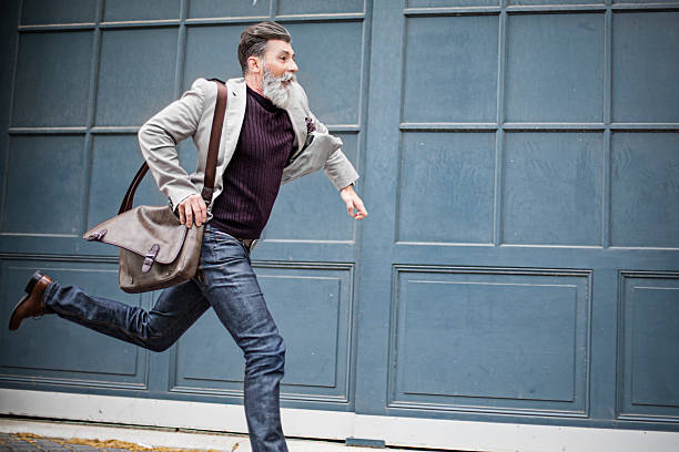 Mature businessman rushing to work