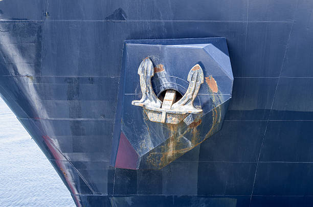 istock Rusty anchor of navy ship 636238210