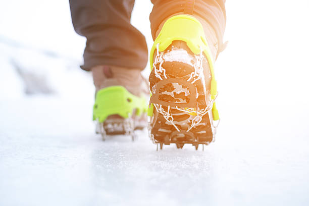 istock Hiking boots with equipment for ice. Snow 636238404