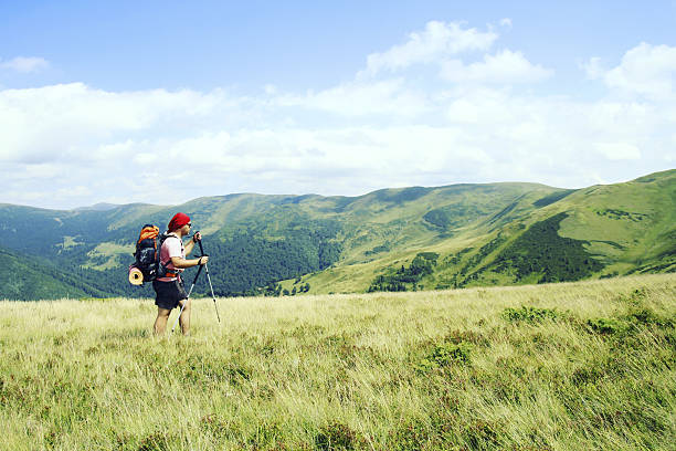 Tourist look his way forward to mountain