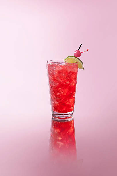 cranberry strawberry cooler cranberry, strawberry cooler on a pink background red drink stock pictures, royalty-free photos & images