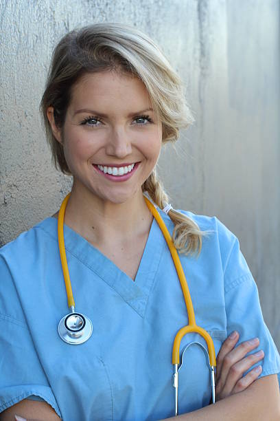 istock Confident female doctor posing in her office 636245224