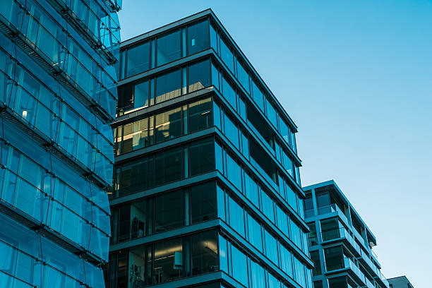 istock beautiful blue colored glass facaded office buildings 636245374