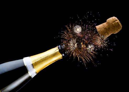 Bottle of Champagne and Cork with Firework